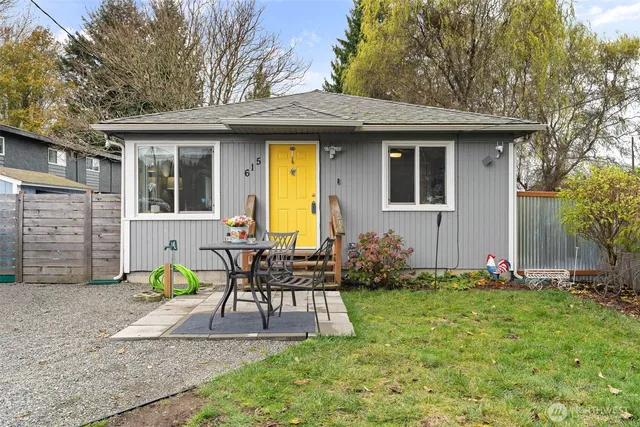 a view of house with patio outdoor seating area
