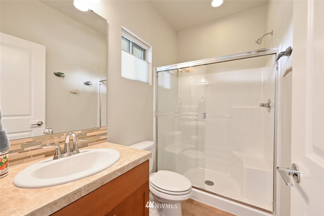 1500 South 28th Street Renton, WA 98055 - Photo 11 of 29 a bathroom with a sink toilet and shower