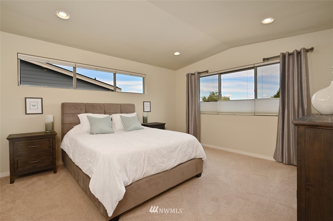 1500 South 28th Street Renton, WA 98055 - Photo 17 of 29 a bedroom with a bed and a window