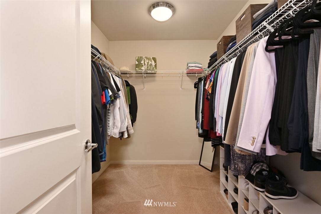 1500 South 28th Street Renton, WA 98055 - Photo 19 of 29 a view of walk in closet with clothes and shoes