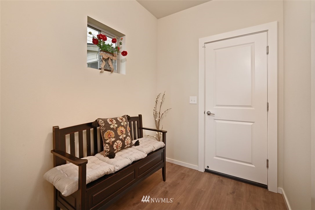 1500 South 28th Street Renton, WA 98055 - Photo 10 of 29 a view of a livingroom with furniture and wooden floor