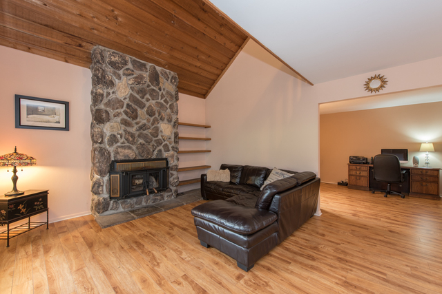 770 Chandler Road Gurnee, IL 60031 - Photo 4 of 31 a living room with furniture and a fireplace