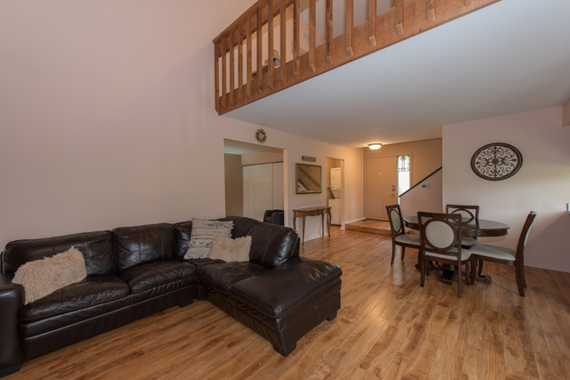 770 Chandler Road Gurnee, IL 60031 - Photo 6 of 31 a living room with furniture and wooden floor