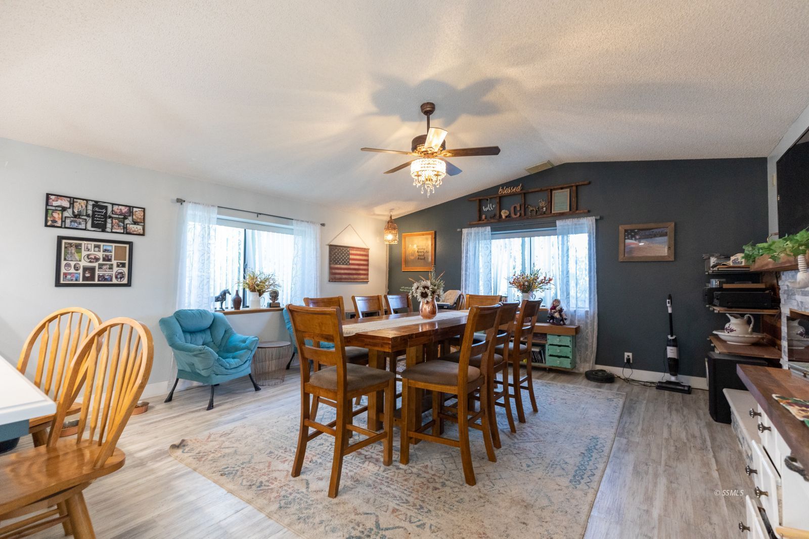 135 Brown Road Inyokern, CA 93527 - Photo 16 of 46 a view of a dining room with furniture window and wooden floor