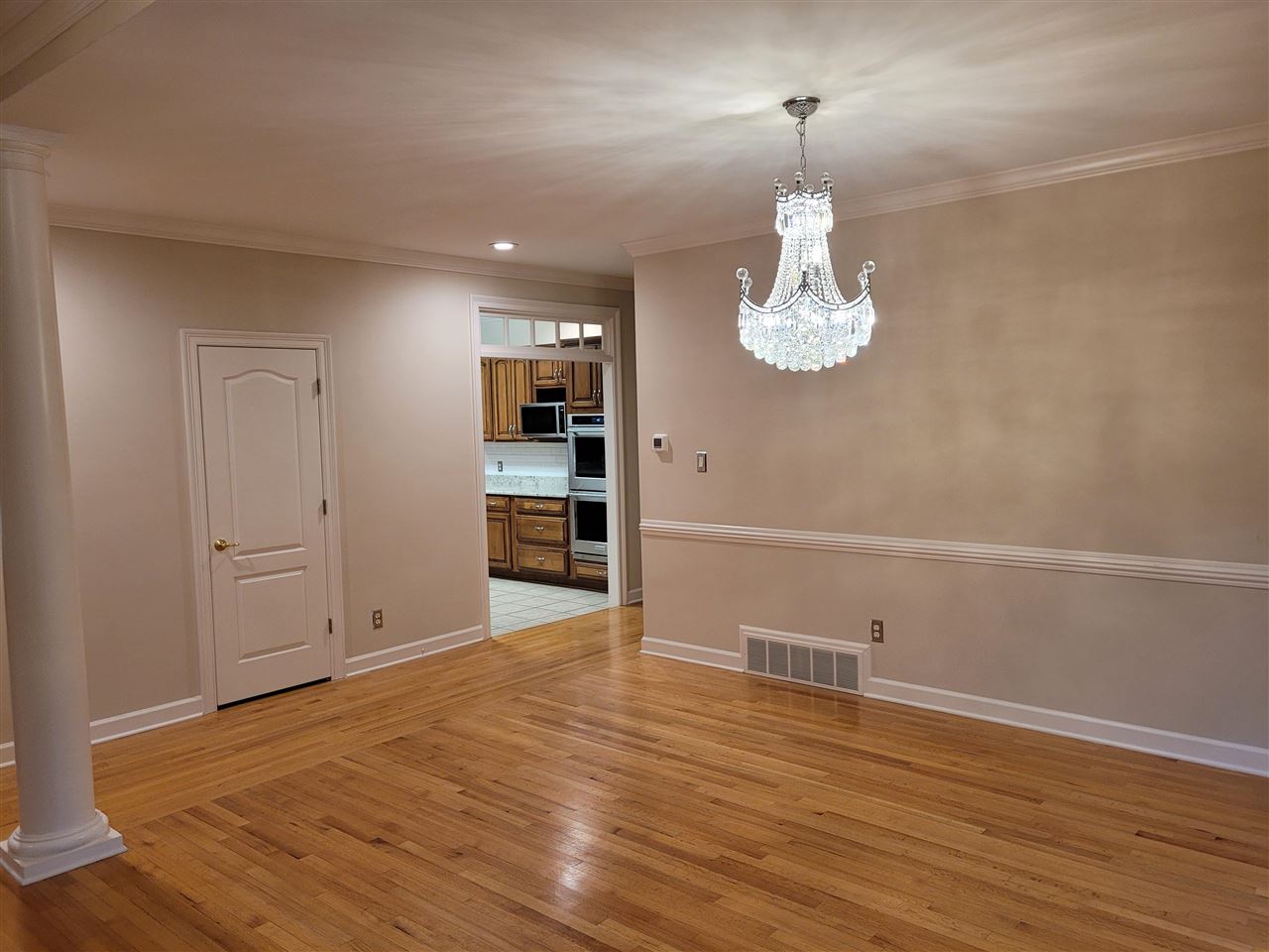 536 Estanaula Road Collierville, TN 38017 - Photo 13 of 25 wooden floor in an empty room with a window