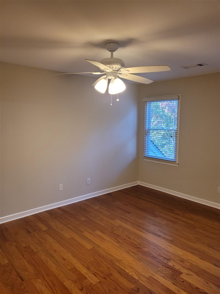 536 Estanaula Road Collierville, TN 38017 - Photo 18 of 25 a view of an empty room with window and wooden floor