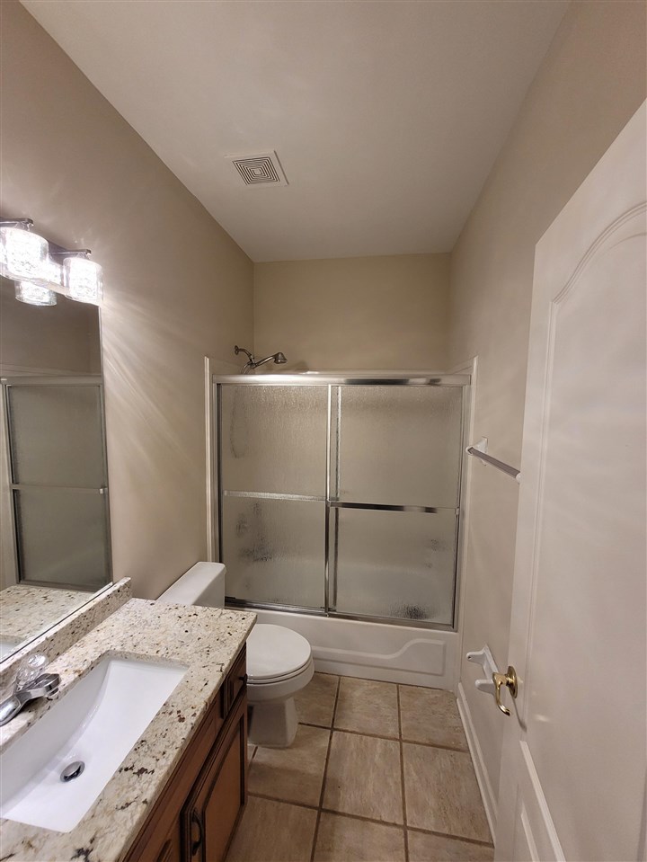 536 Estanaula Road Collierville, TN 38017 - Photo 23 of 25 a bathroom with a sink a toilet and shower