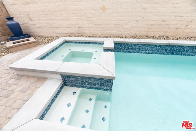 a living room with a wooden floor