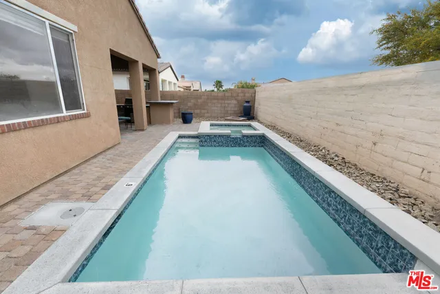 a view of balcony and kitchen