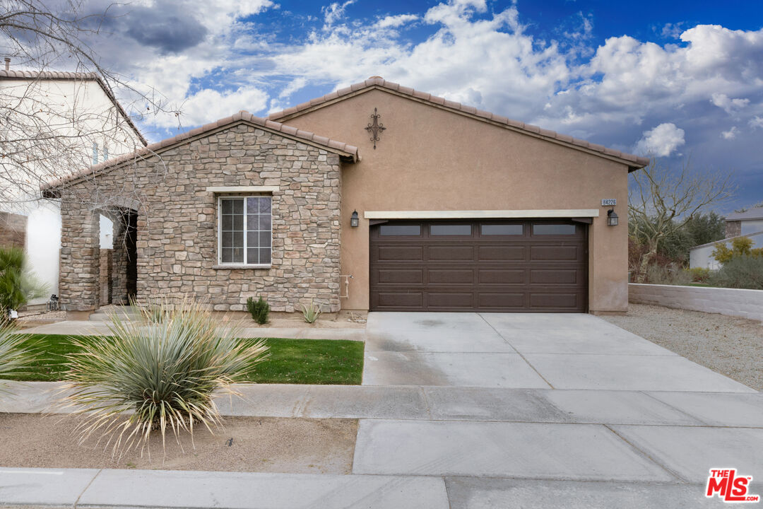 84226 Canzone Drive Indio, CA 92203 - Photo 23 of 23 a front view of house with yard