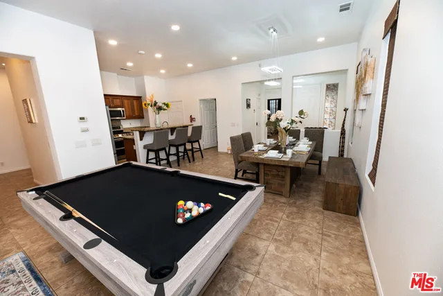 a living room with furniture and a table