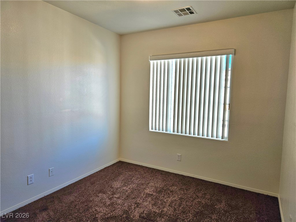 8941 Marmot Ridge Court Las Vegas, NV 89149 - Photo 15 of 22 Bedroom 3