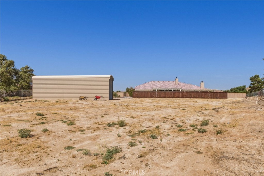 19501 Kinai Road Apple Valley, CA 92307 - Photo 49 of 49 a view of a dry yard covered with snow