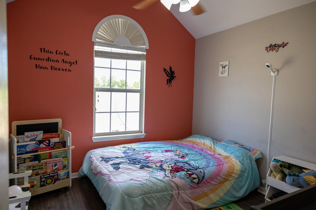 4773 Patton Lake Road Aquilla, TX 76622 - Photo 17 of 25 a bedroom with a bed and a window