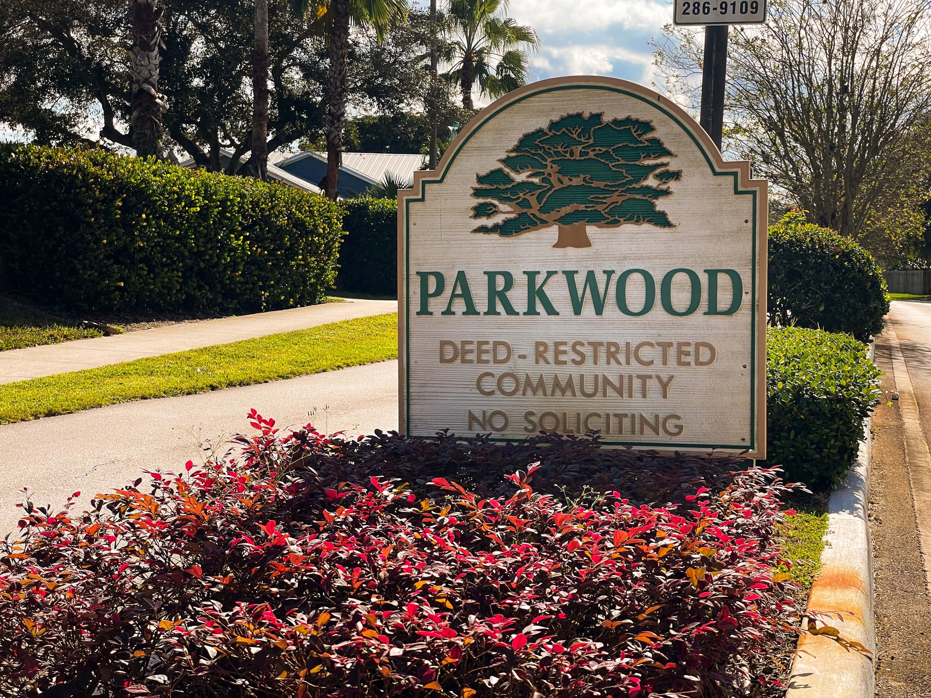 6690 Southeast Raintree Avenue Stuart, FL 34997 - Photo 43 of 43 a sign on the side of the road