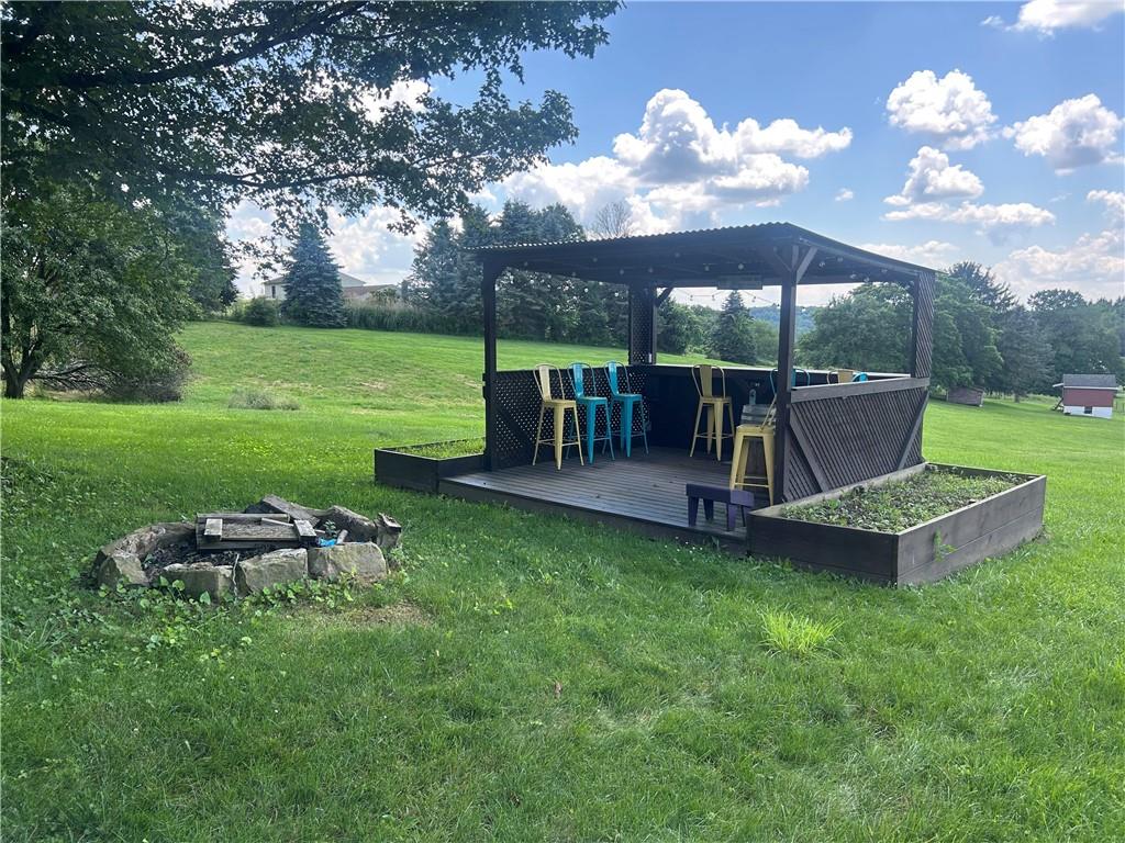 618 Patterson Road Apollo, PA 15613 - Photo 23 of 36 a view of a table and chairs in the garden