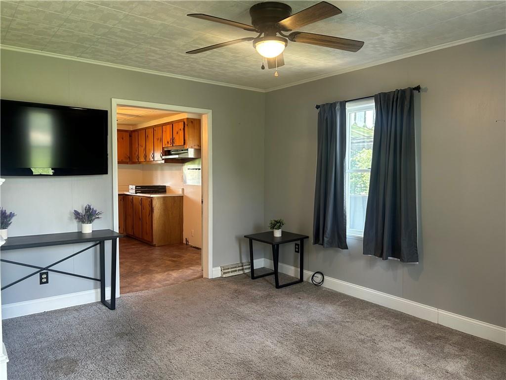618 Patterson Road Apollo, PA 15613 - Photo 5 of 36 a living room with furniture and a flat screen tv