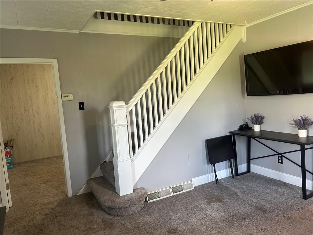 618 Patterson Road Apollo, PA 15613 - Photo 6 of 36 a view of a livingroom with furniture and staircase