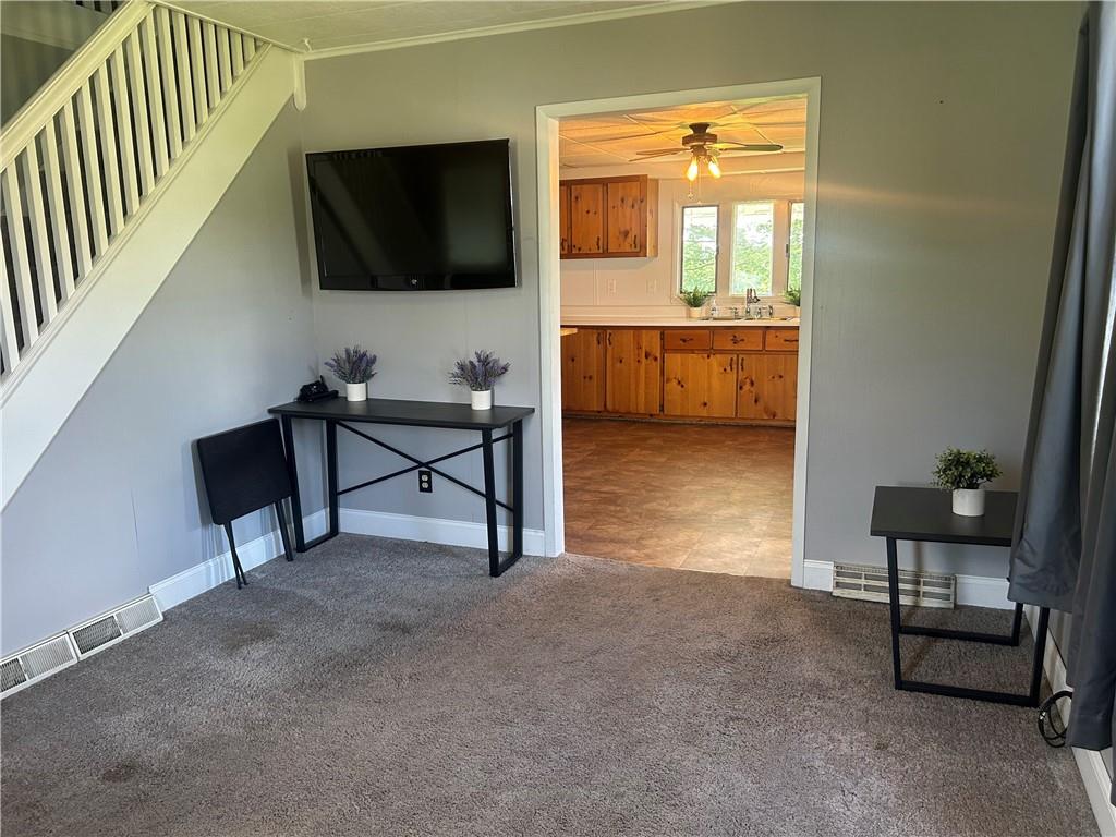 618 Patterson Road Apollo, PA 15613 - Photo 7 of 36 a living room with furniture and a flat screen tv