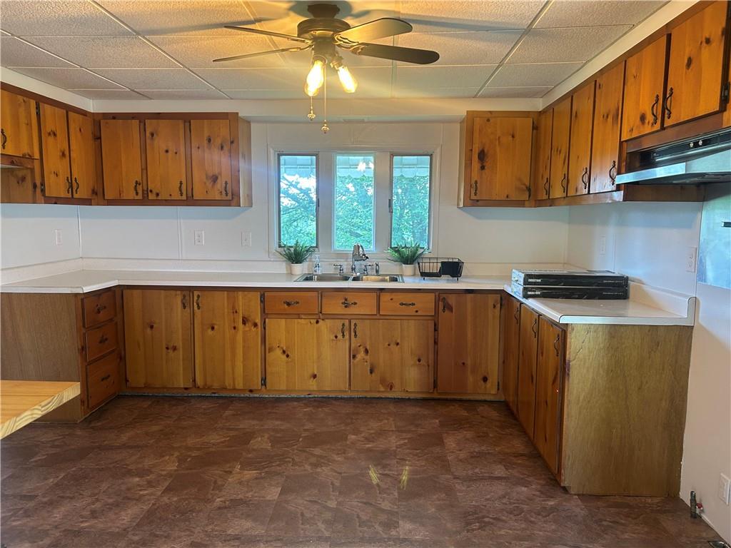 618 Patterson Road Apollo, PA 15613 - Photo 9 of 36 a kitchen with a sink stove and cabinets