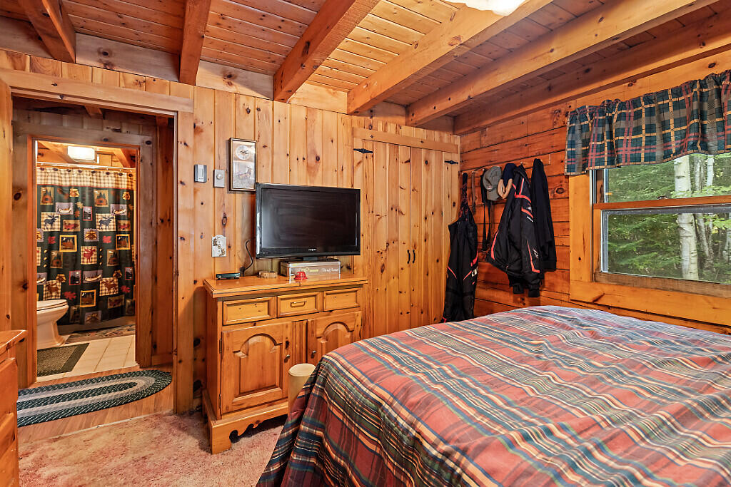 11 Woods Road Dallas Plt, ME 04970 - Photo 23 of 58 Primary Bedroom