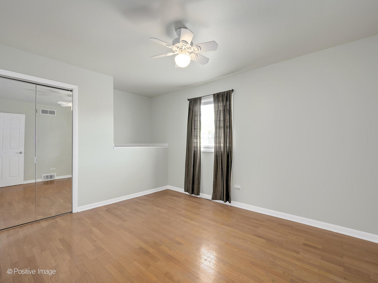 11S568 Book Road Naperville, IL 60564 - Photo 14 of 25 a view of a livingroom with a chandelier fan