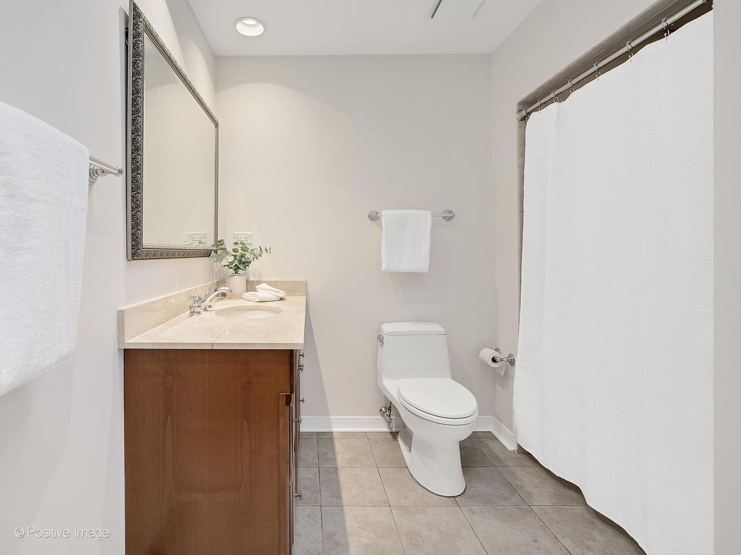 11S568 Book Road Naperville, IL 60564 - Photo 15 of 25 a bathroom with a toilet sink and mirror