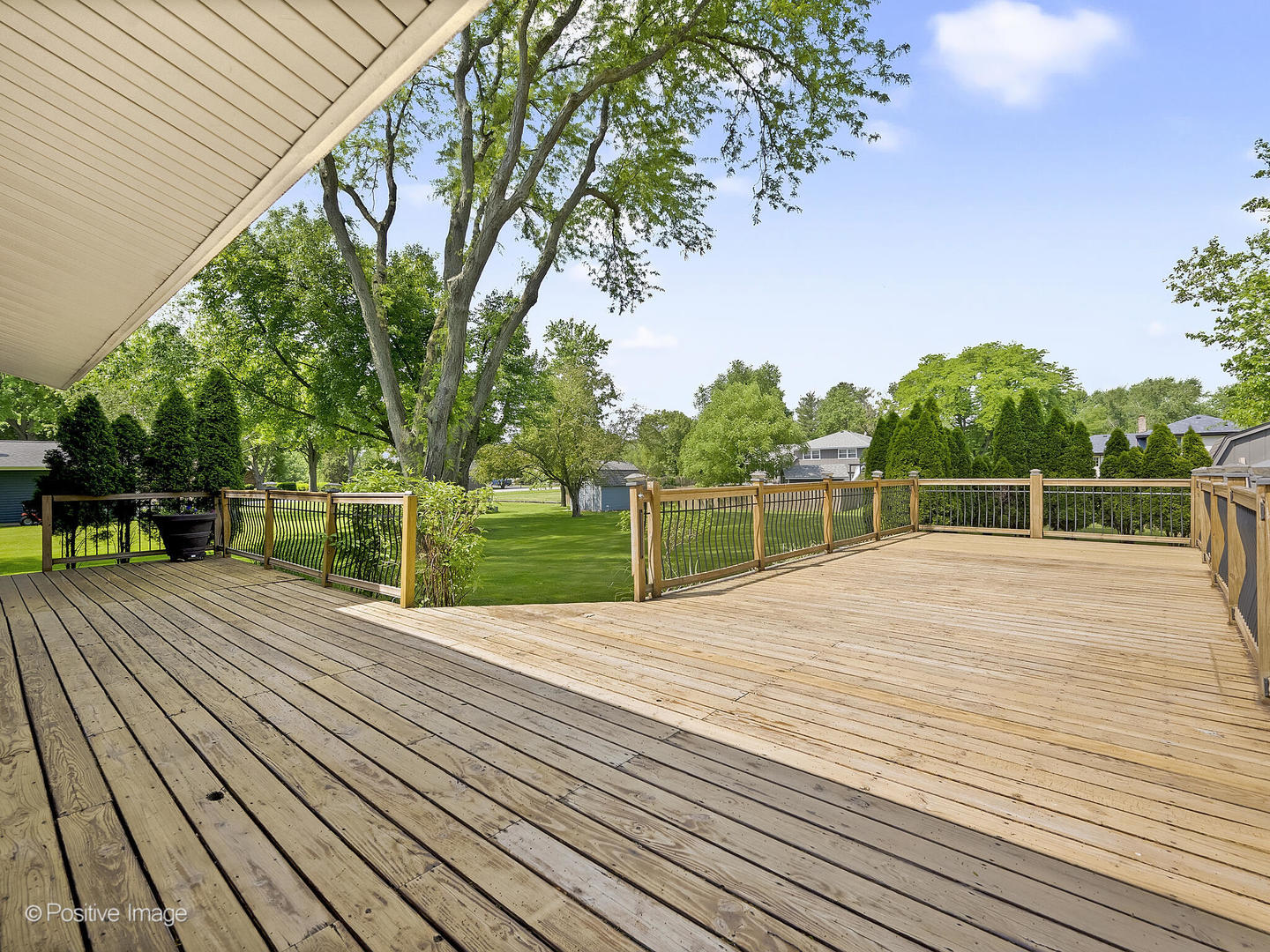 11S568 Book Road Naperville, IL 60564 - Photo 20 of 25 a view of a backyard with a wooden fence