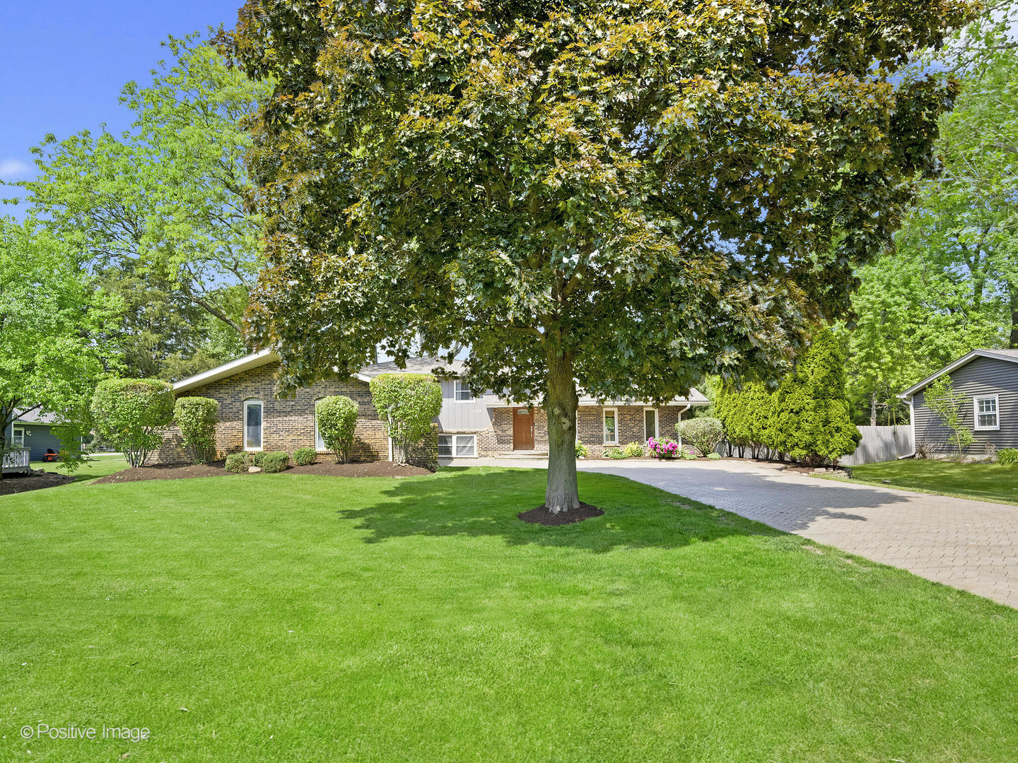 11S568 Book Road Naperville, IL 60564 - Photo 2 of 25 a view of a house with a yard