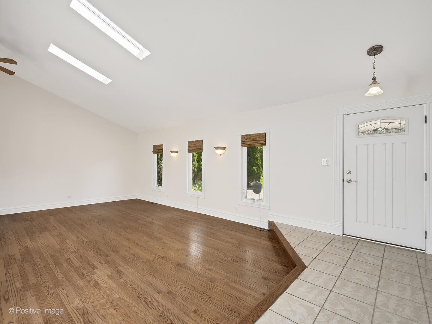 11S568 Book Road Naperville, IL 60564 - Photo 4 of 25 a view of empty room with wooden floor