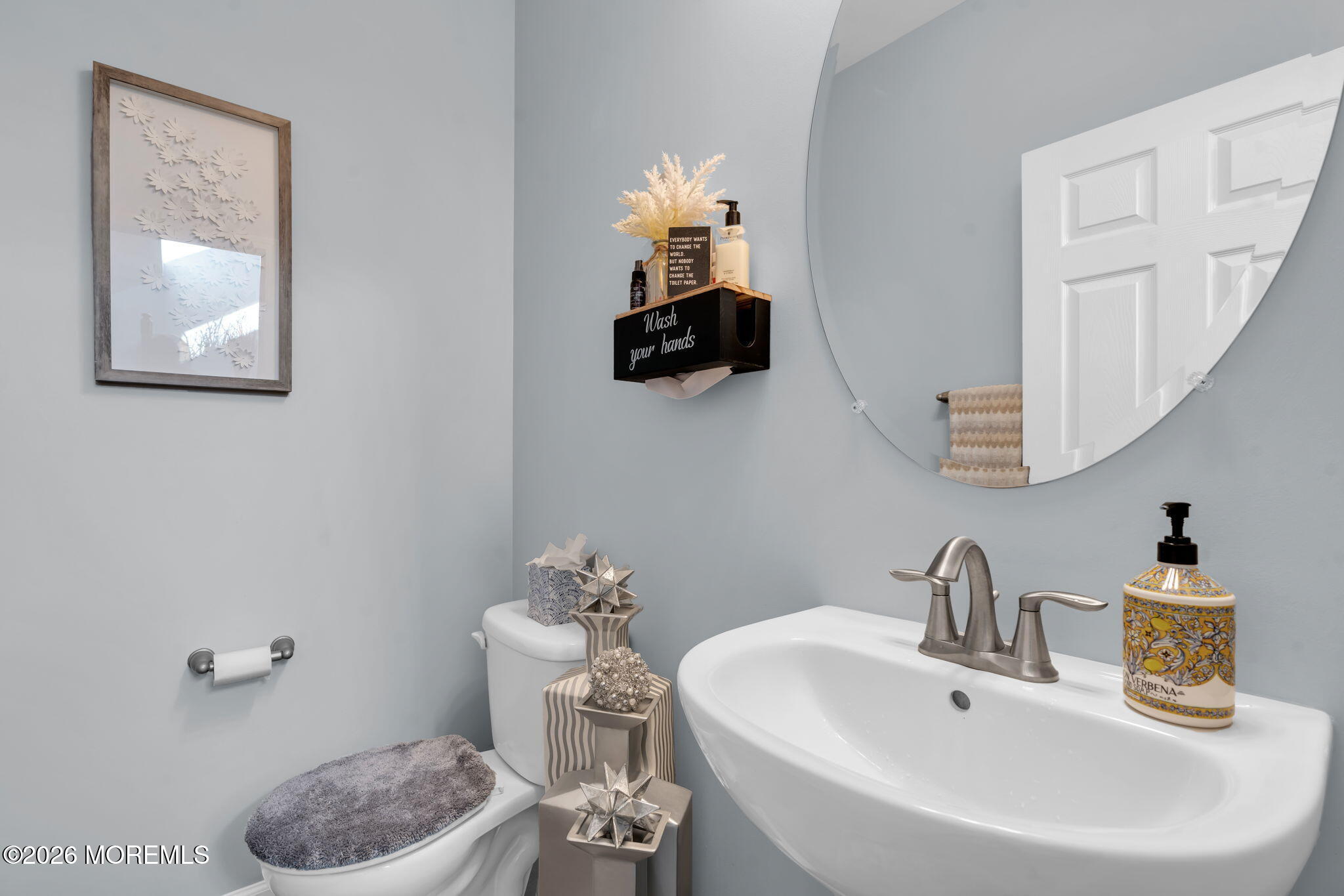 62 Santa Rosa Lane Tinton Falls, NJ 07753 - Photo 11 of 23 a bathroom with a sink and a toilet