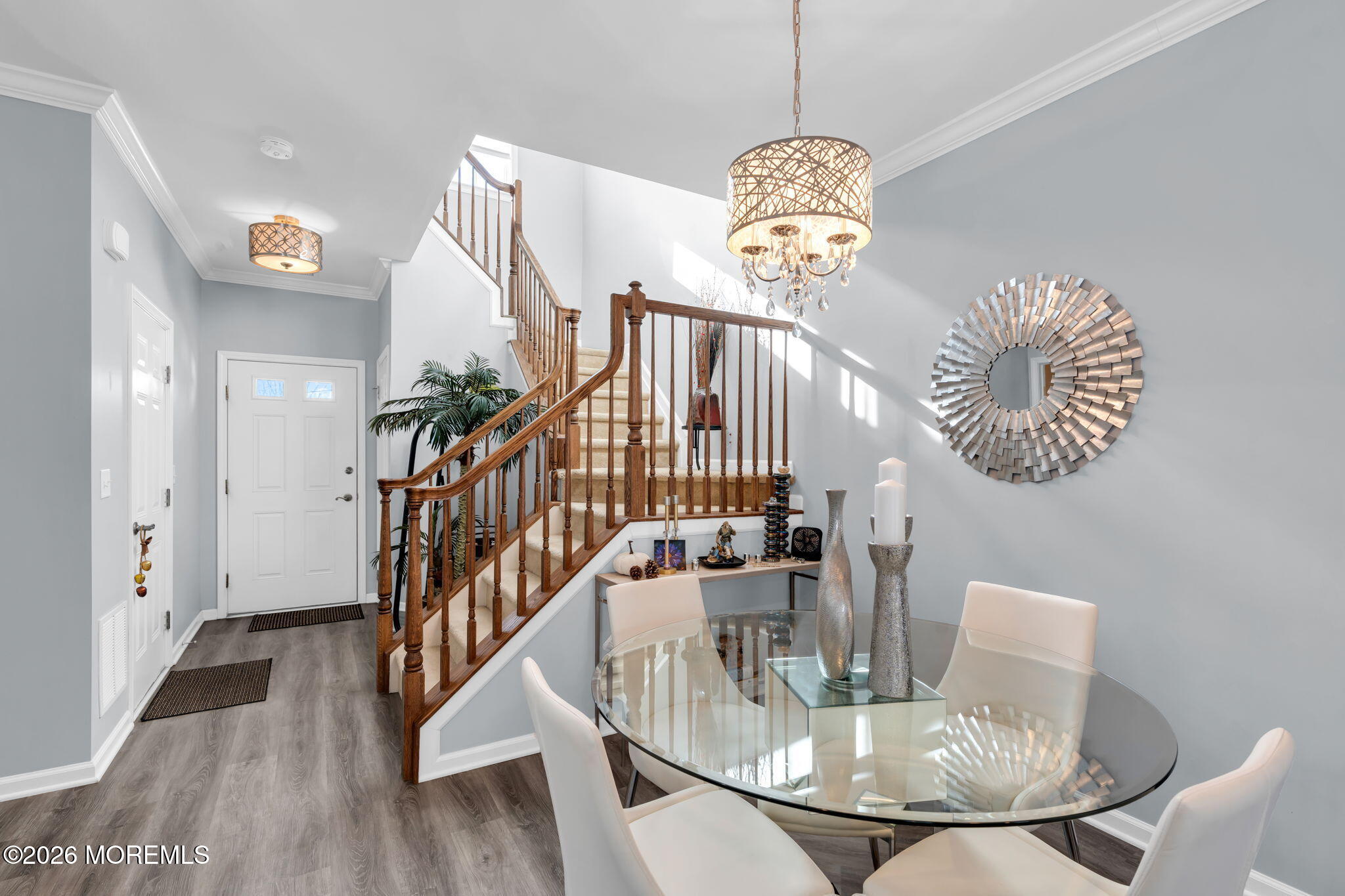 62 Santa Rosa Lane Tinton Falls, NJ 07753 - Photo 13 of 23 a view of a dining room with furniture a chandelier and wooden floor