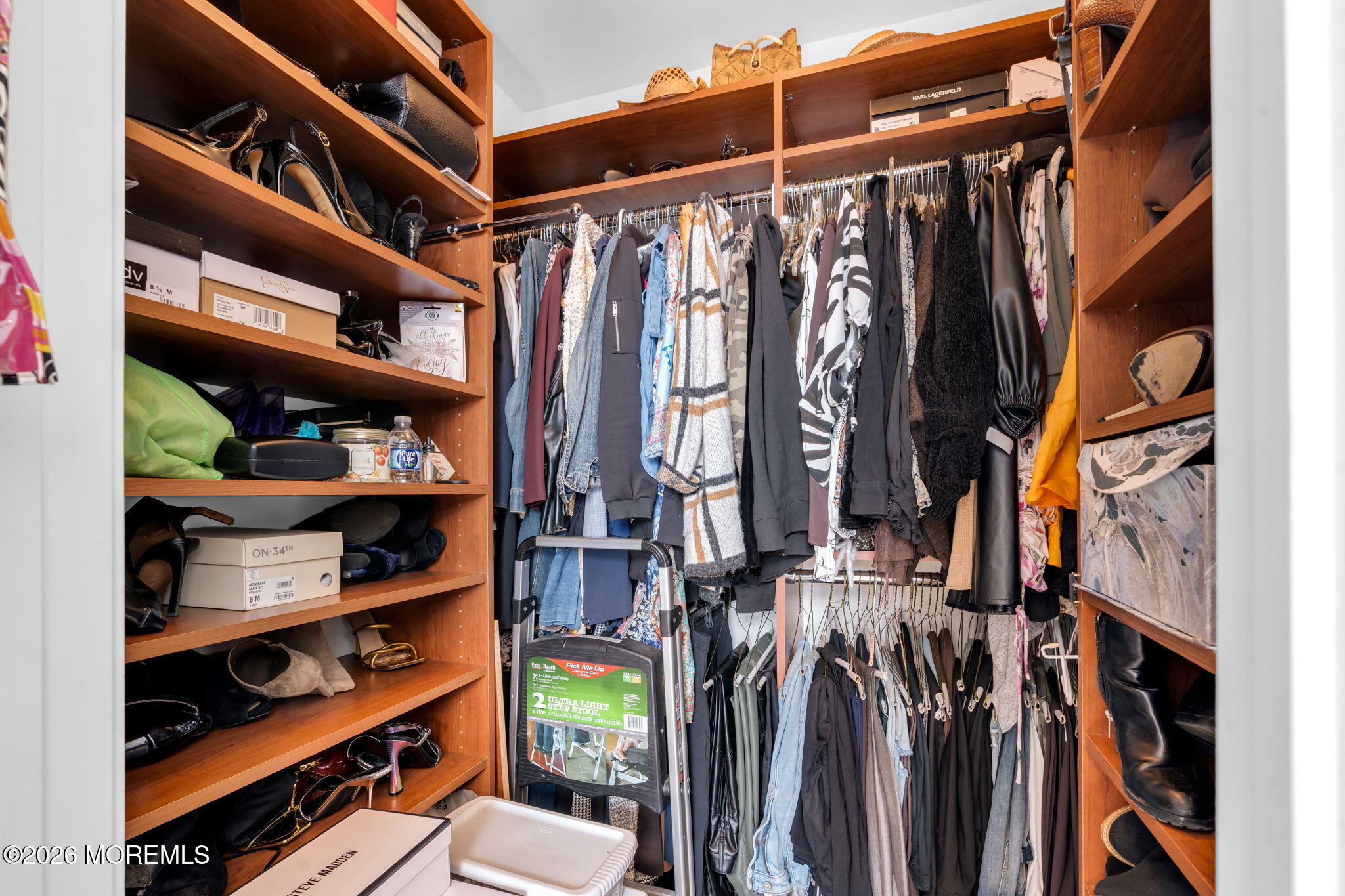 62 Santa Rosa Lane Tinton Falls, NJ 07753 - Photo 17 of 23 a view of walk in closet with clothes and shoes