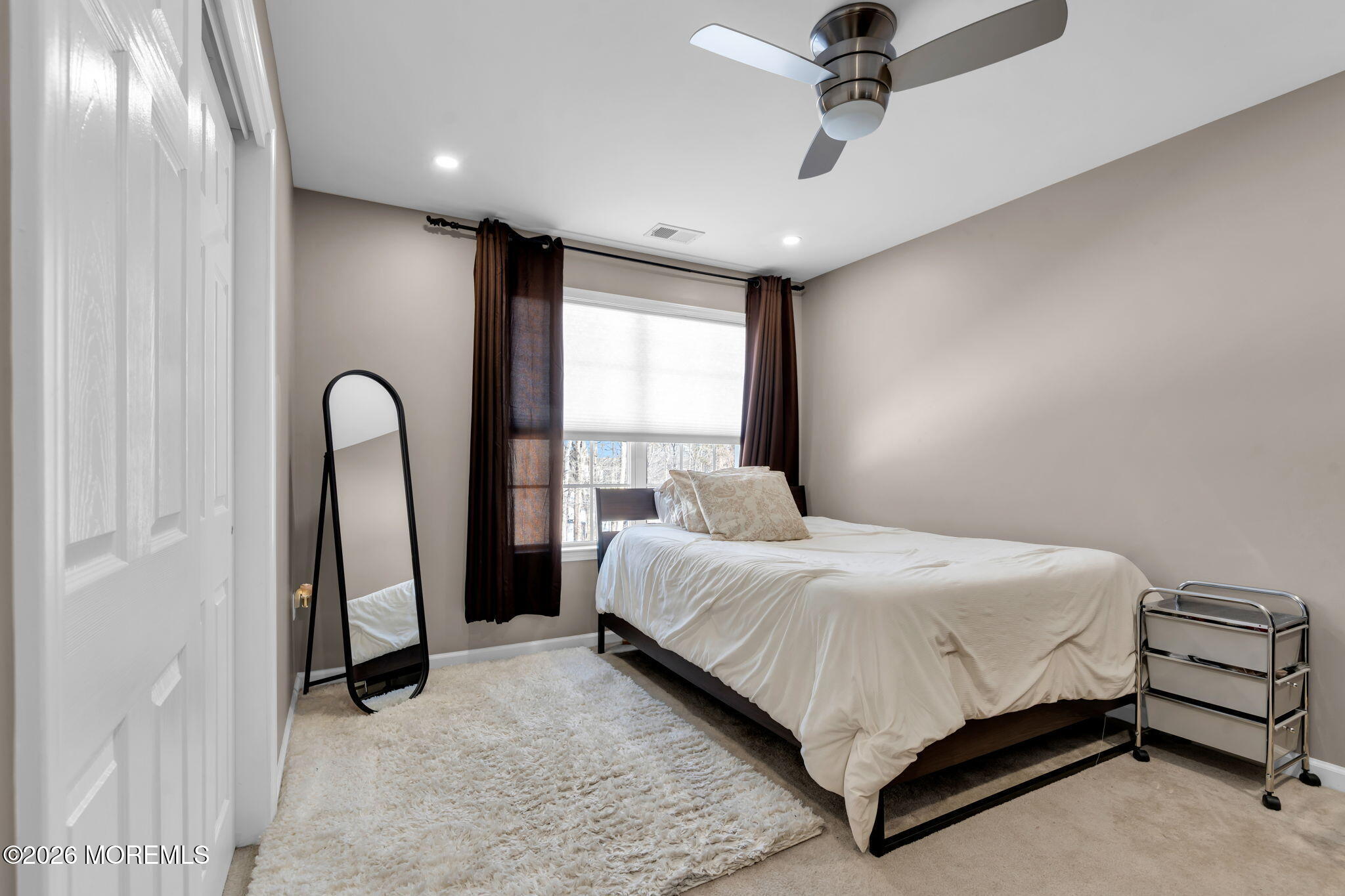 62 Santa Rosa Lane Tinton Falls, NJ 07753 - Photo 20 of 23 a bedroom with a bed and a window