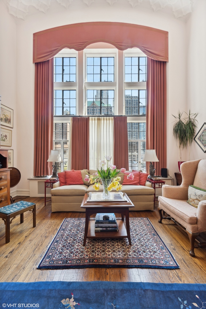20 East Cedar Street, Unit 6E Chicago, IL 60611 - Photo 14 of 35 a living room with furniture and a rug