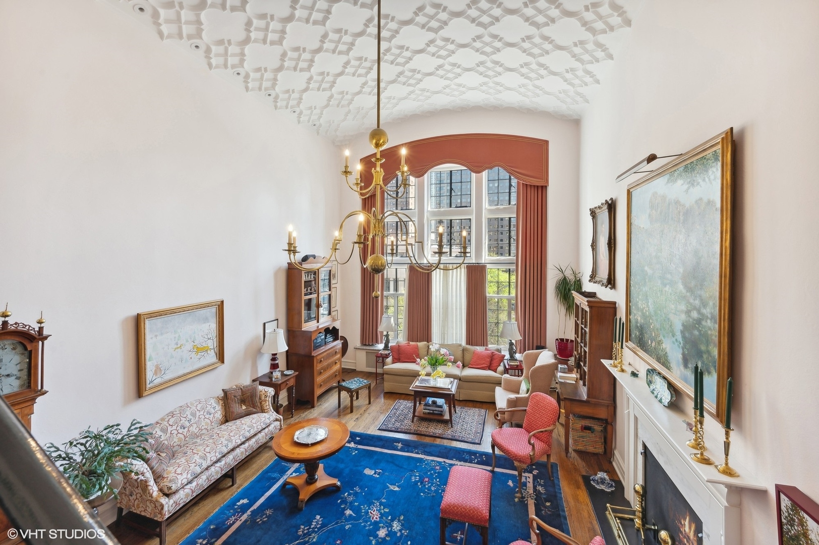 20 East Cedar Street, Unit 6E Chicago, IL 60611 - Photo 19 of 35 a living room with furniture a window and a chandelier