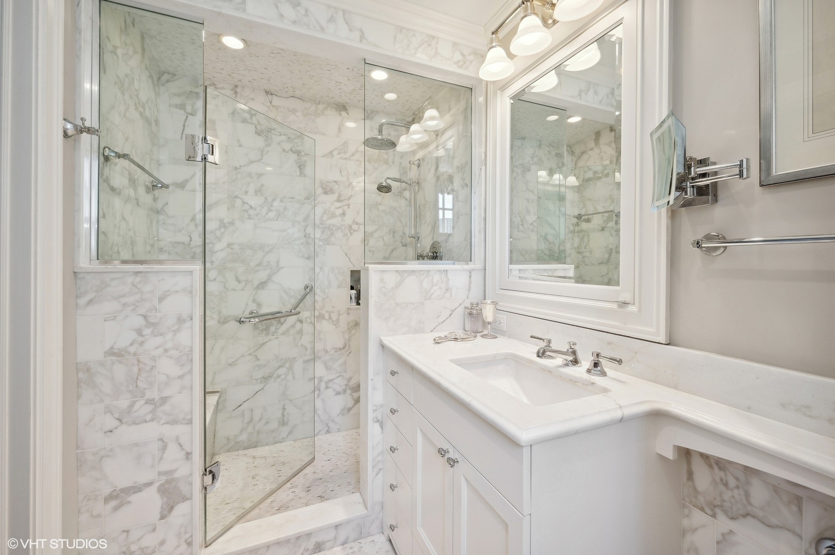 20 East Cedar Street, Unit 6E Chicago, IL 60611 - Photo 25 of 35 a bathroom with a sink shower and a mirror