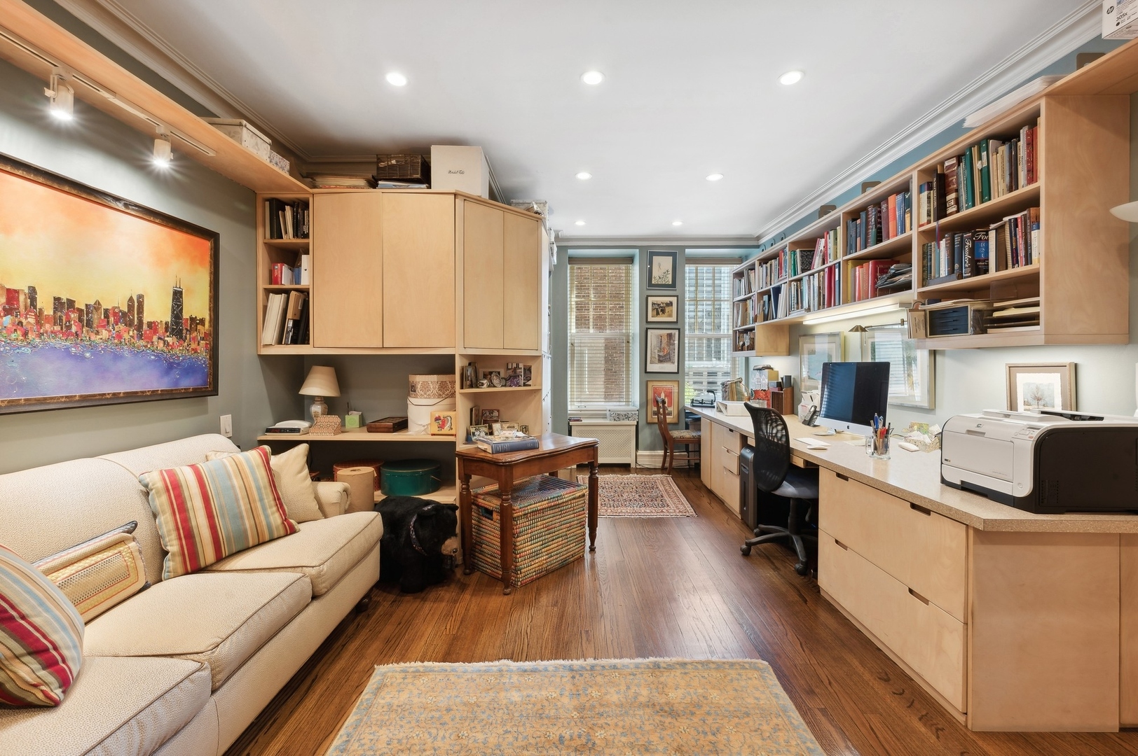 20 East Cedar Street, Unit 6E Chicago, IL 60611 - Photo 28 of 35 a living room with stainless steel appliances furniture a rug and a kitchen