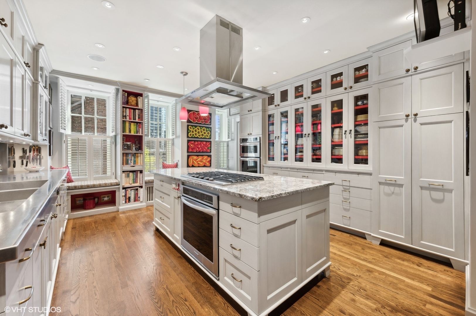 20 East Cedar Street, Unit 6E Chicago, IL 60611 - Photo 4 of 35 a kitchen with stainless steel appliances granite countertop a stove and a large window