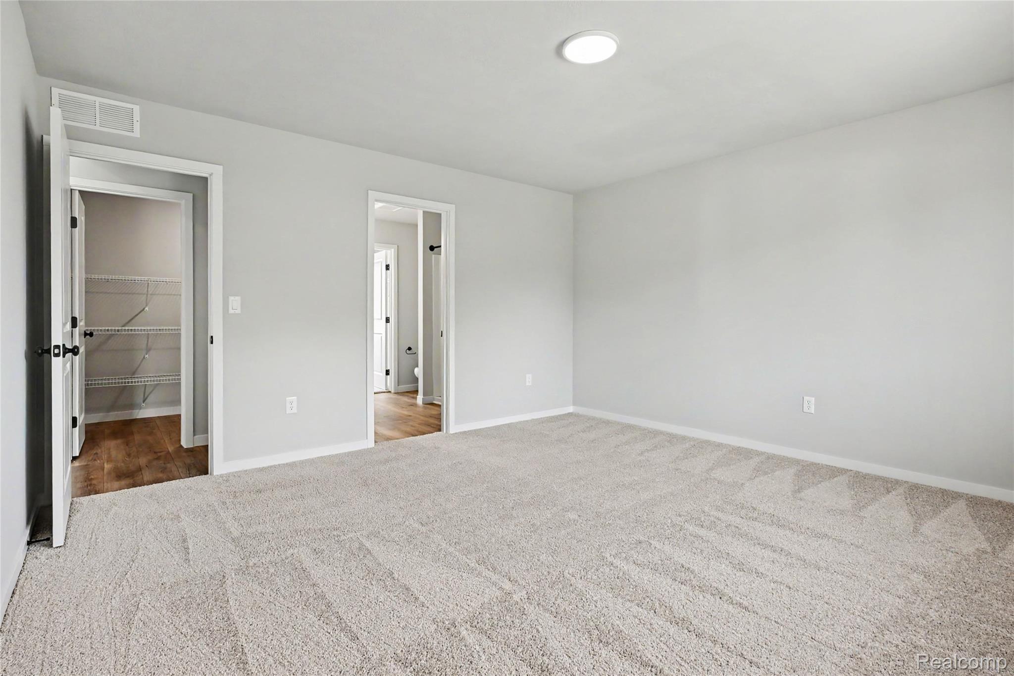 1222 Lockes Street Howell, MI 48843 - Photo 10 of 36 Stock Photo-Primary Bedroom