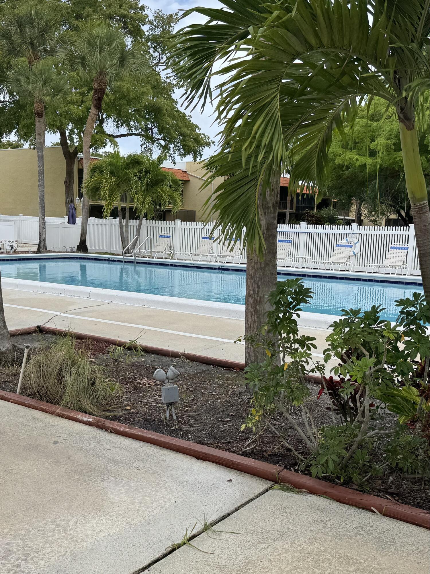 912 Southwest 9th St Circle, Unit 101 Boca Raton, FL 33486 - Photo 23 of 25 a view of garden