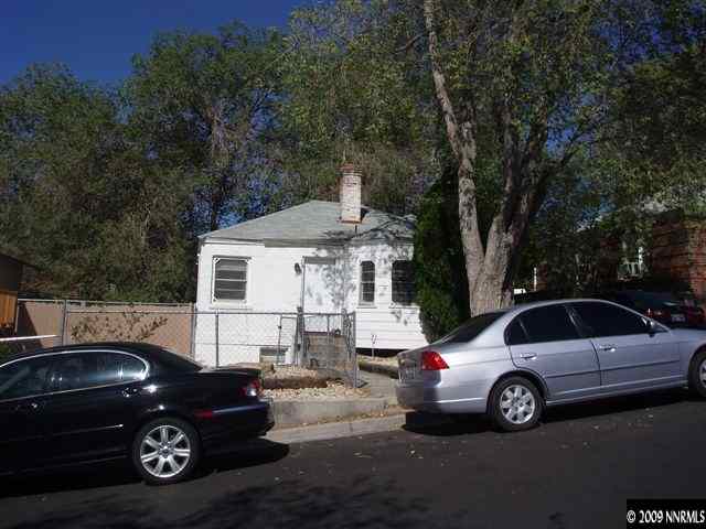 1101 The Strand Reno, NV 89503 - Photo 2 of 6 a car parked in front of a house