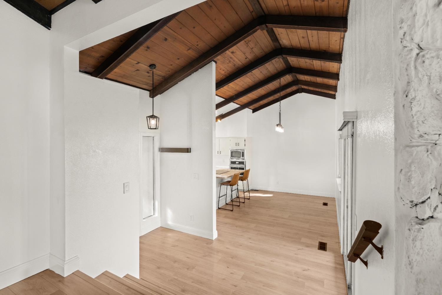 24626 Oro Valley Road Auburn, CA 95602 - Photo 18 of 54 a view of empty room with wooden floor