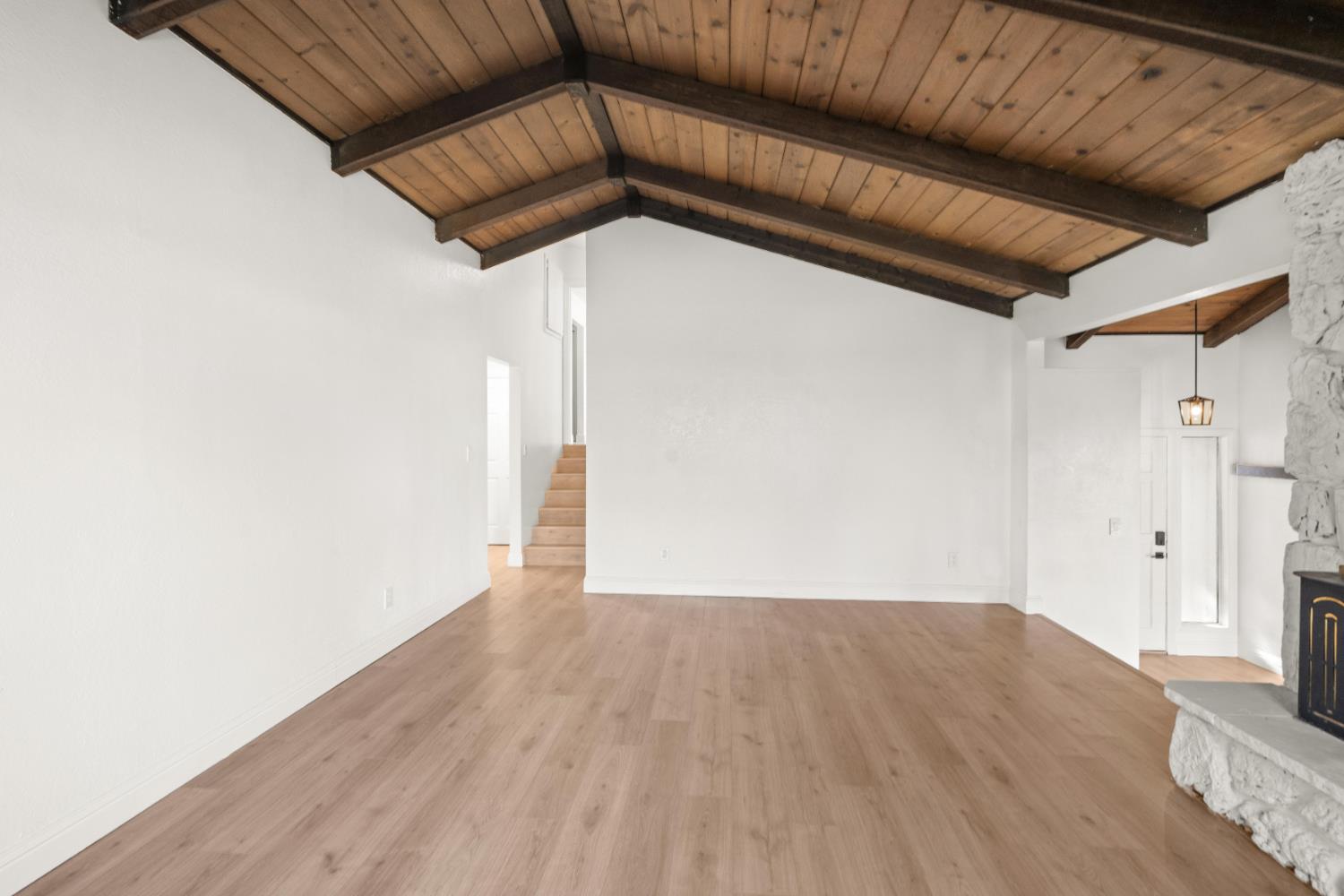 24626 Oro Valley Road Auburn, CA 95602 - Photo 22 of 54 a view of a hallway with wooden floor
