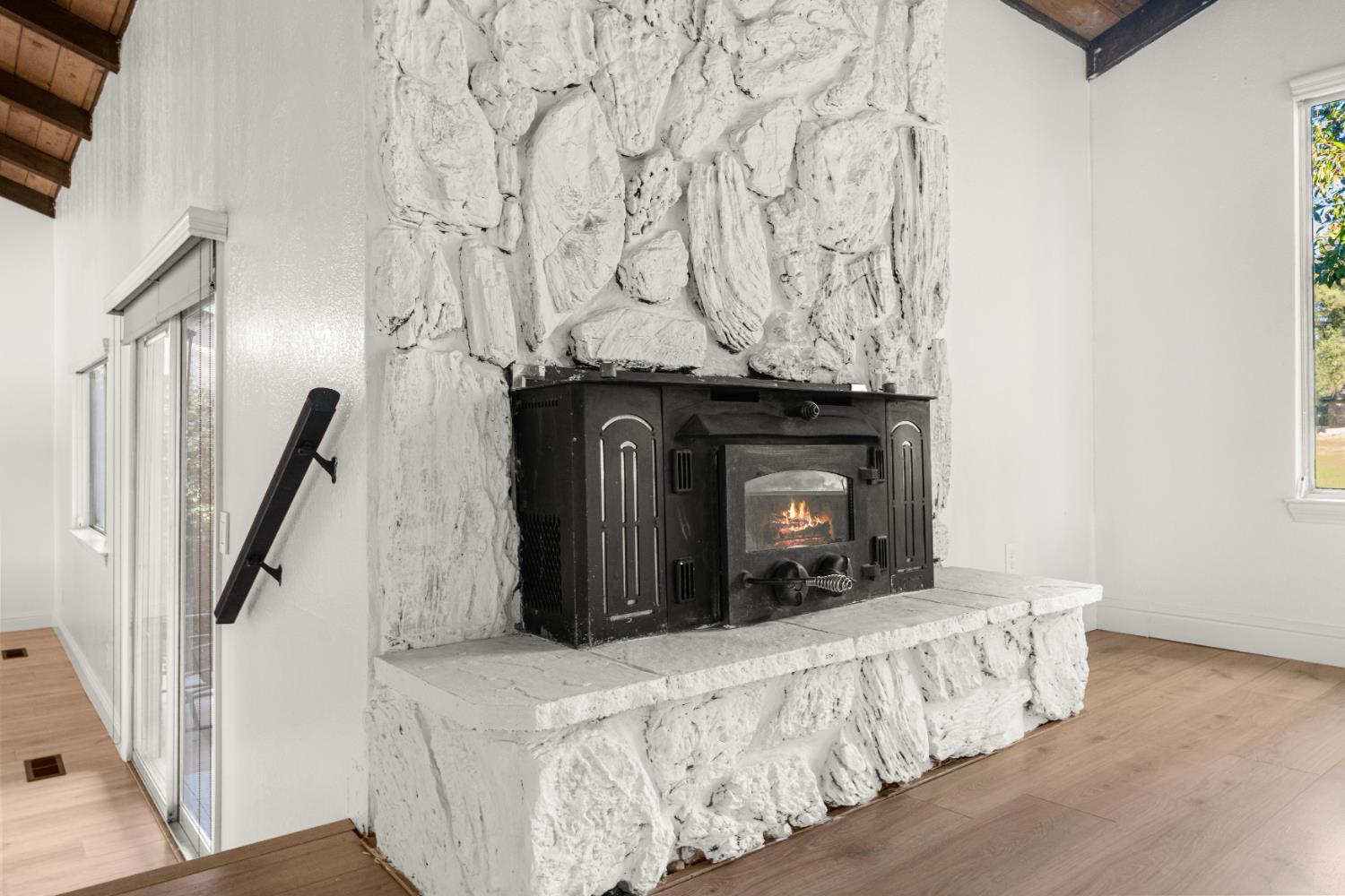 24626 Oro Valley Road Auburn, CA 95602 - Photo 24 of 54 a view of a fireplace in the room