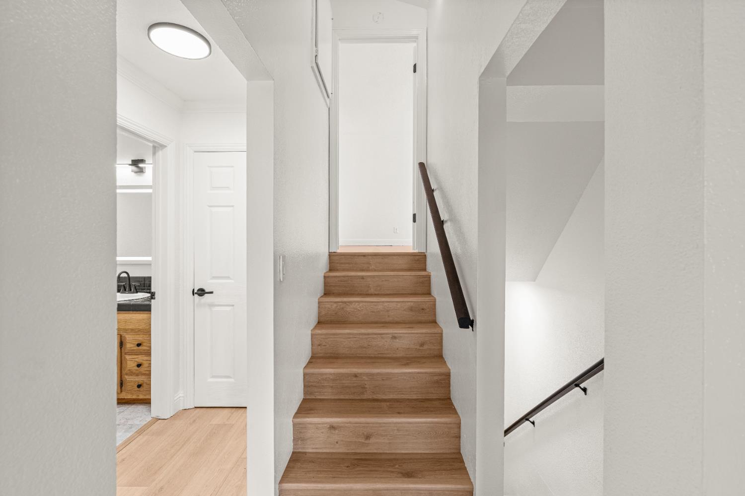 24626 Oro Valley Road Auburn, CA 95602 - Photo 25 of 54 a view of entryway with wooden floor and stairs
