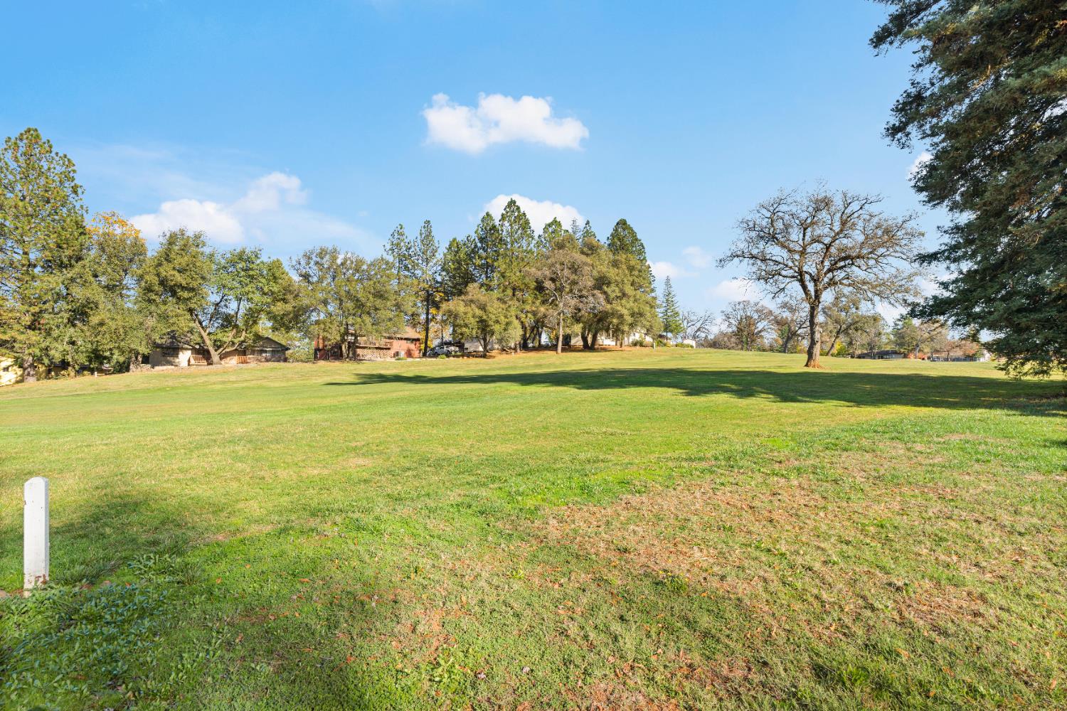24626 Oro Valley Road Auburn, CA 95602 - Photo 44 of 54 a view of an ocean and a yard