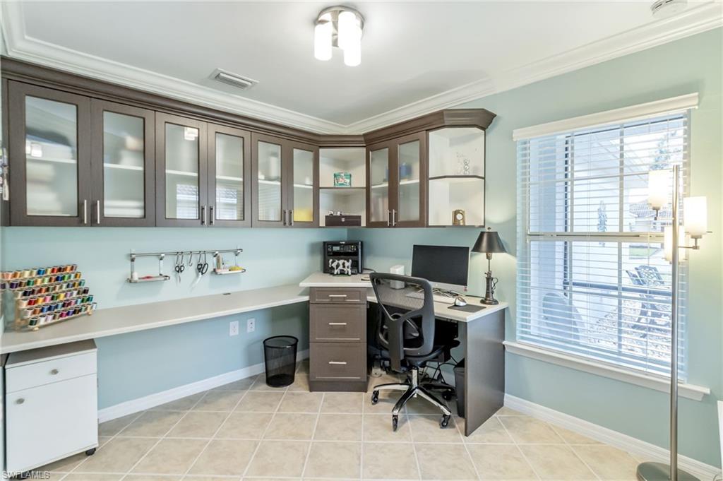 5801 Declaration Court Ave Maria, FL 34142 - Photo 13 of 38 a view of a workspace with a window