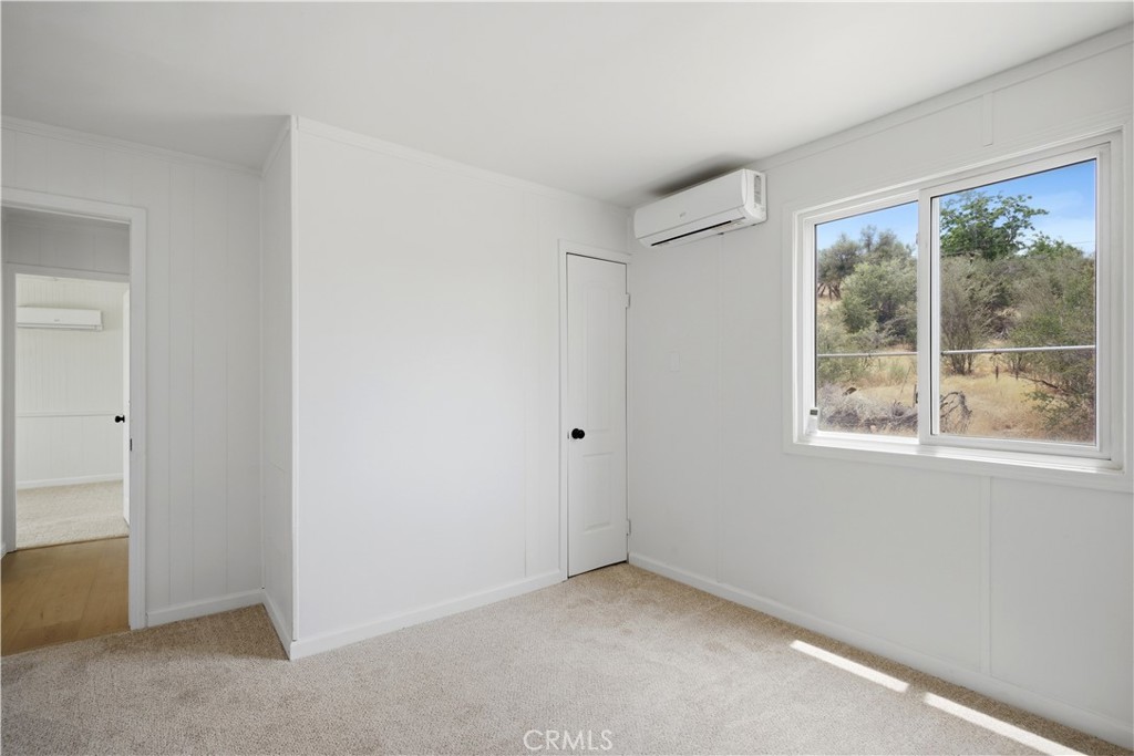 59995 Granite Gulley Road Anza, CA 92539 - Photo 18 of 33 an empty room with windows