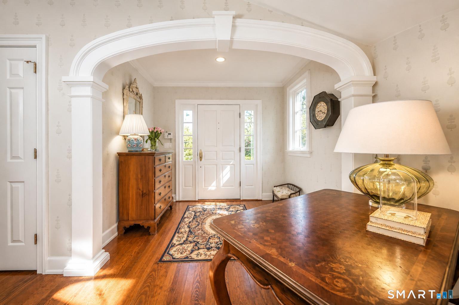 1681 Fairfield Beach Road Fairfield, CT 06824 - Photo 19 of 36 From the moment you enter, timeless architectural details and elevator access reflect the home's thoughtful design.